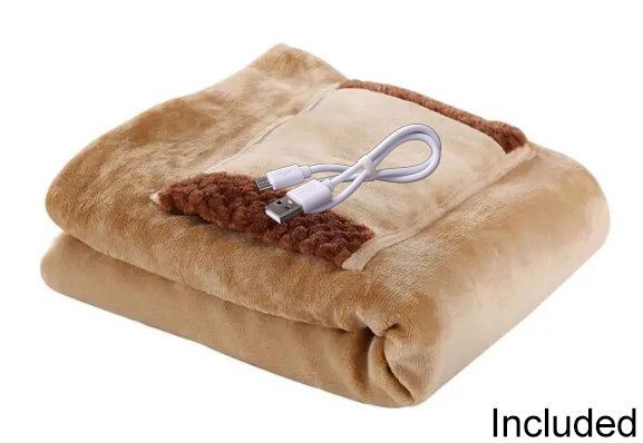 Photo of a folded up plush usb electric blanket with a USB cable on the top.